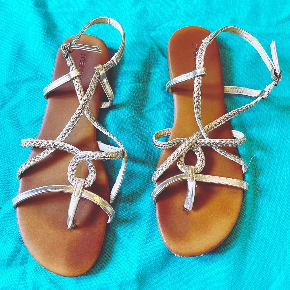 Lightly worn rose gold braided sandals.